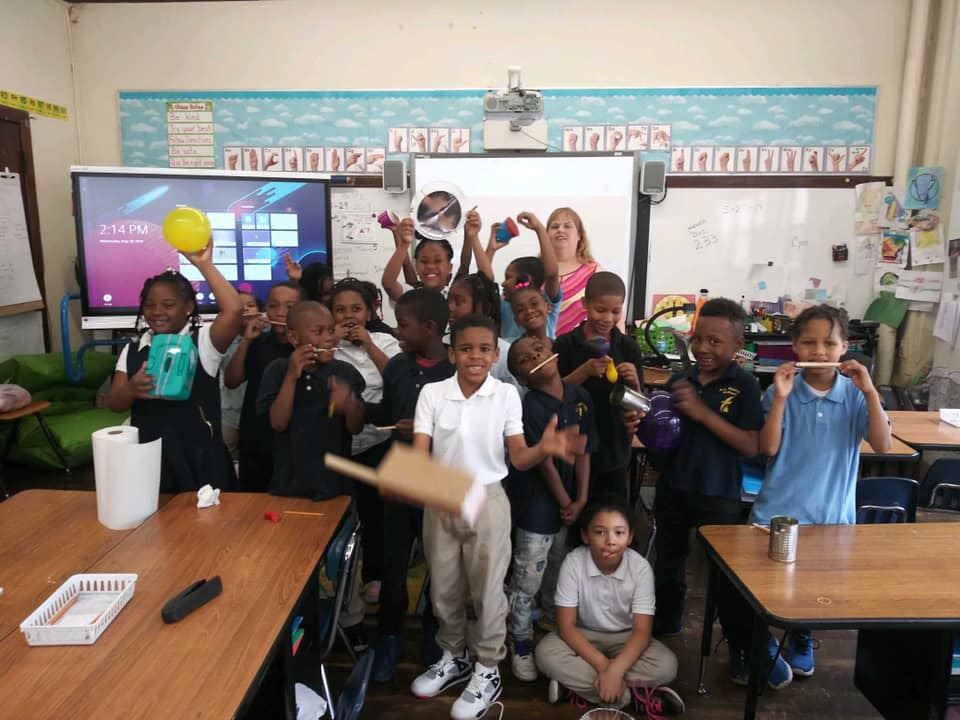  Students and teacher in classroom